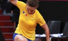 九游体育APP-罗马尼亚队士气高涨，取得胜利晋级